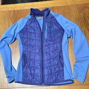 SmartWOOL zip jacket with quilted front & thumb holes.